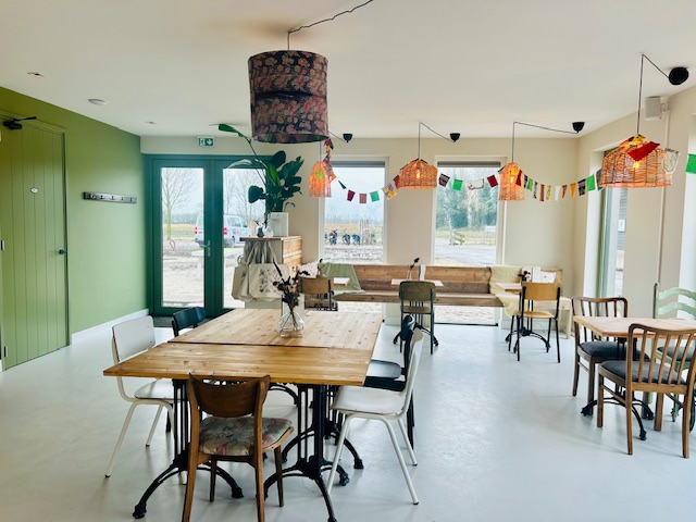 Theehuis Het Theehuis van Land in Zicht gelegen op het erf van Tuinpark Laakzijde